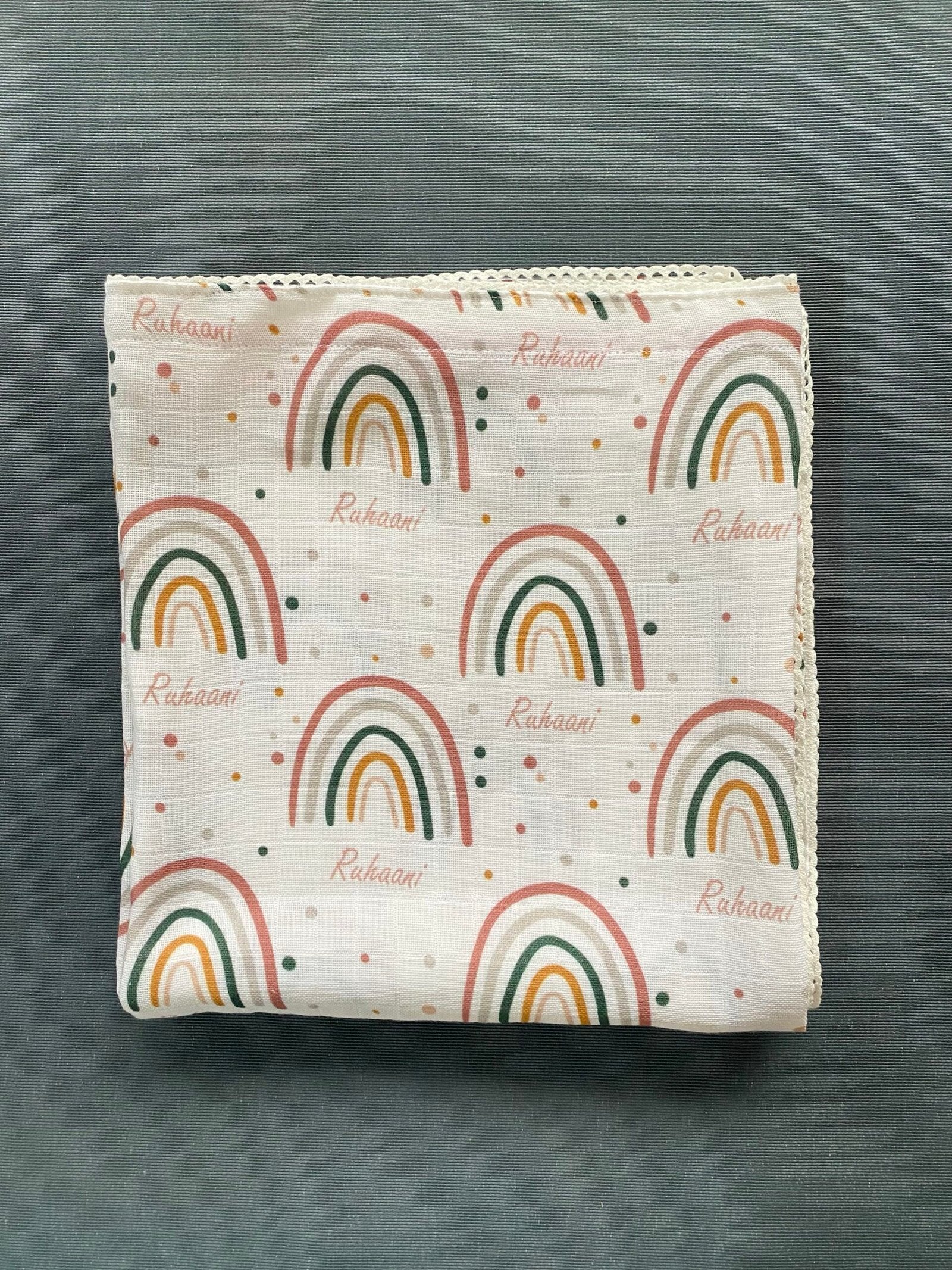 Rainbow and dots customised swaddle